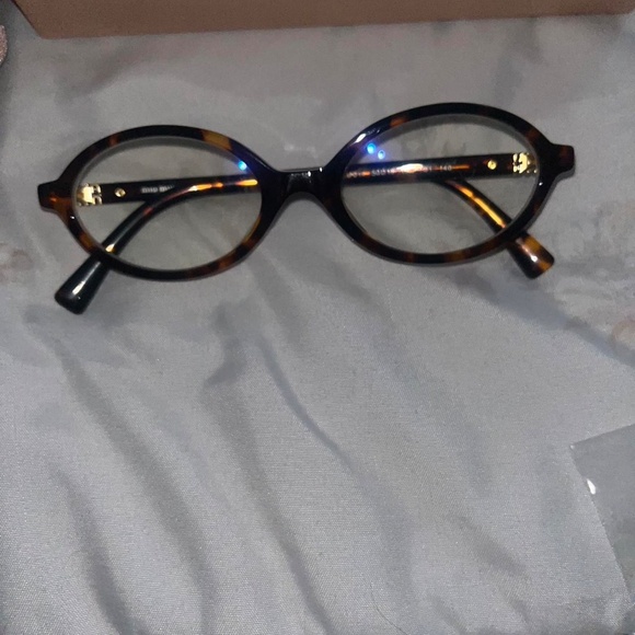 Miu Miu Women\'s Oval Glasses Brown and Black Regard Glasses main image 6